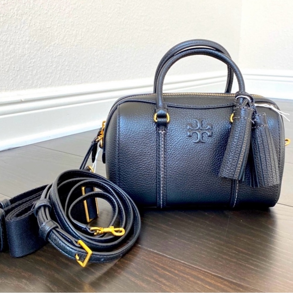 Tory Burch Black and Gold Mini Barrel Bag.